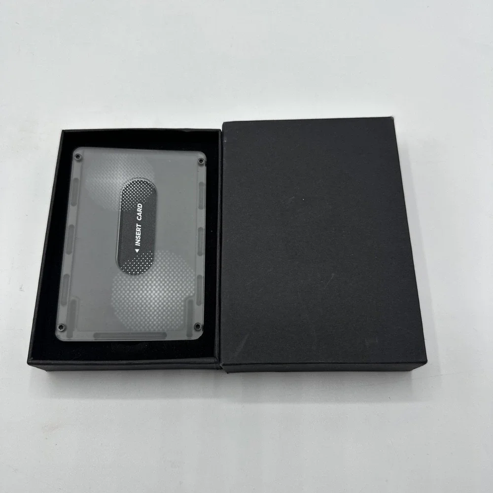 Minimalist Wallet Black New In Box With Extra Straps.